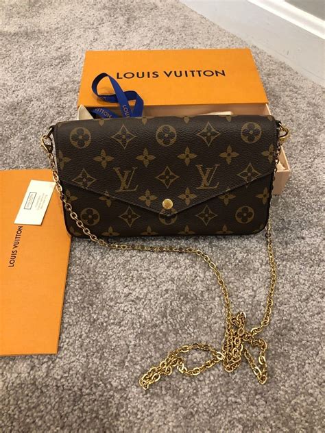 louis vuitton black purse with gold chain|black louis vuitton shoulder bag.